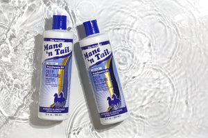 Deep Moisture Shampoo and Conditioner both blue in color and with Mane n Tail branding in a small pool of water
